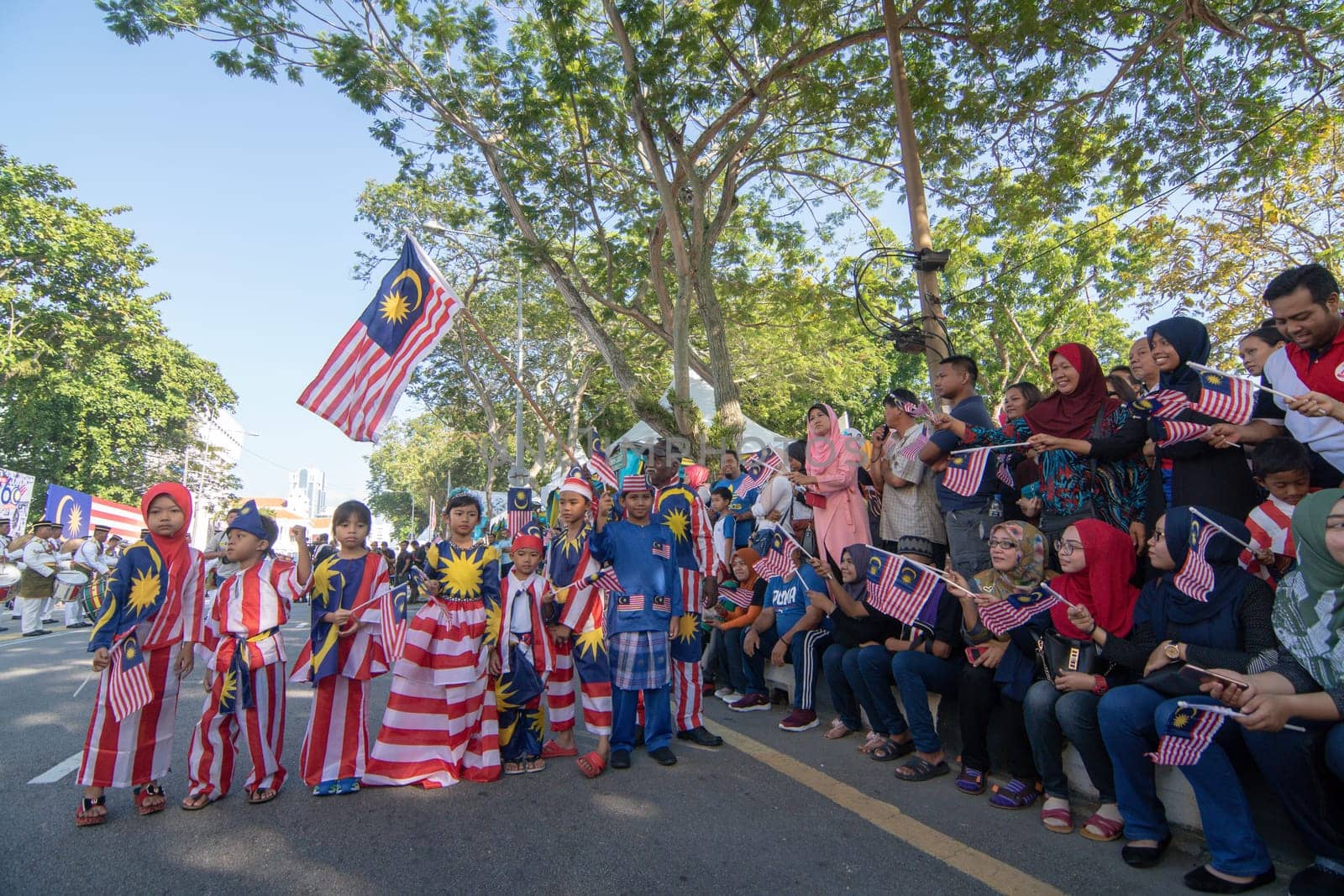 George Town, Penang/Malaysia - Aug 31 2017: Local Malaysian wear jalur gemilang costume to national day celebration.