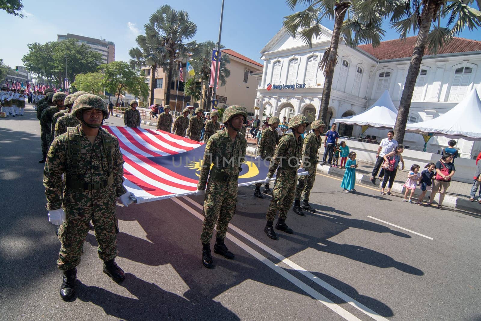 George Town, Penang/Malaysia - Aug 31 2017: Malaysia soldier marching with Malaysia flag.