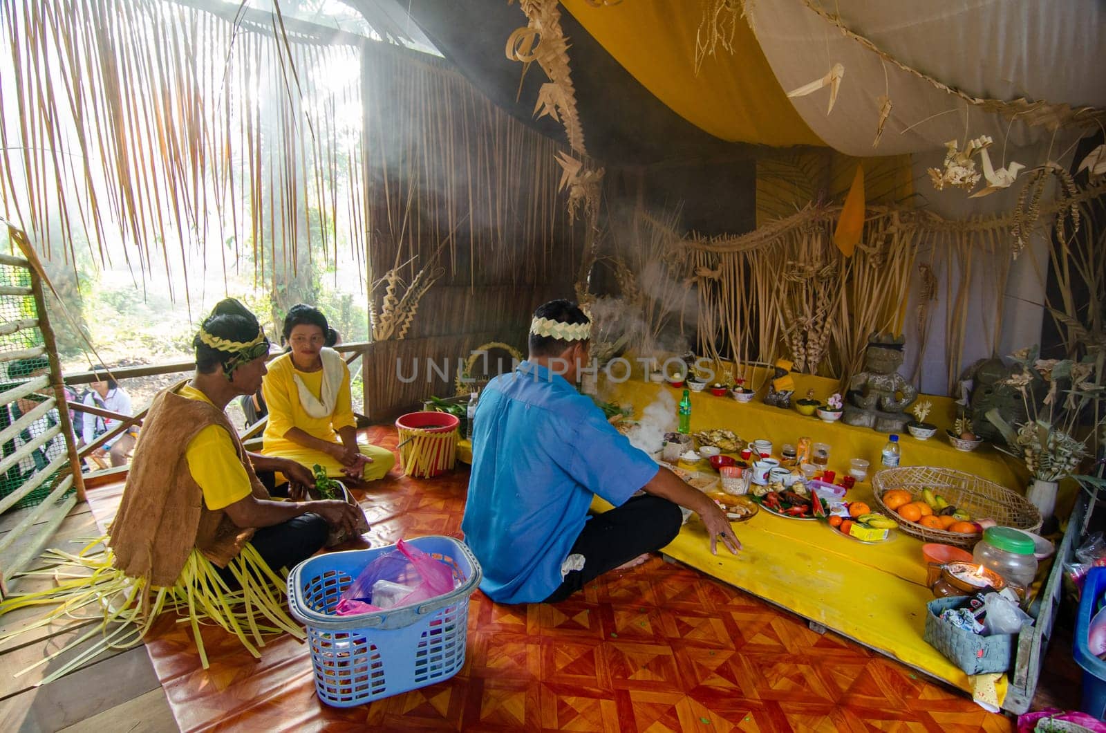 Carey Island, Selangor/Malaysia - Mar 17 2018: Malaysia aborigine Mah Meri with mask at oil palm estate, Malaysia indigenous Mah Meri perform traditional cultural at wooden house.