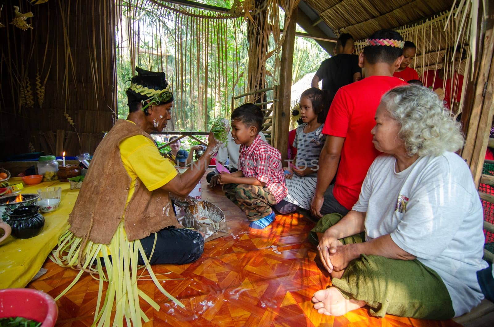 Carey Island, Selangor/Malaysia - Mar 17 2018: Malaysia aborigine Mah Meri with mask at oil palm estate, Mah Meri indigenous community pray spirit.