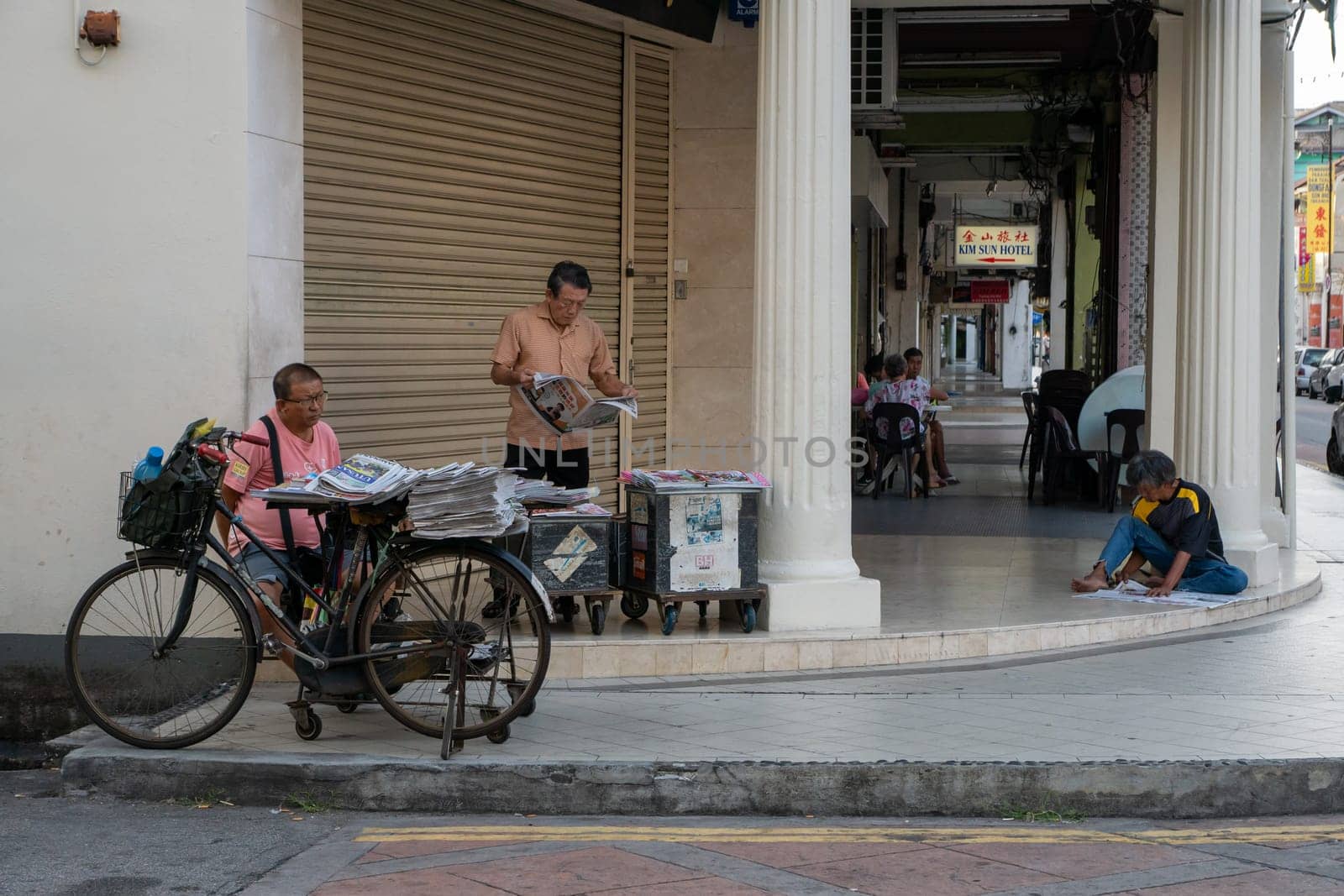 George Town, Penang/Malaysia - Jul 19 2018: Street life of different people at Georgetown