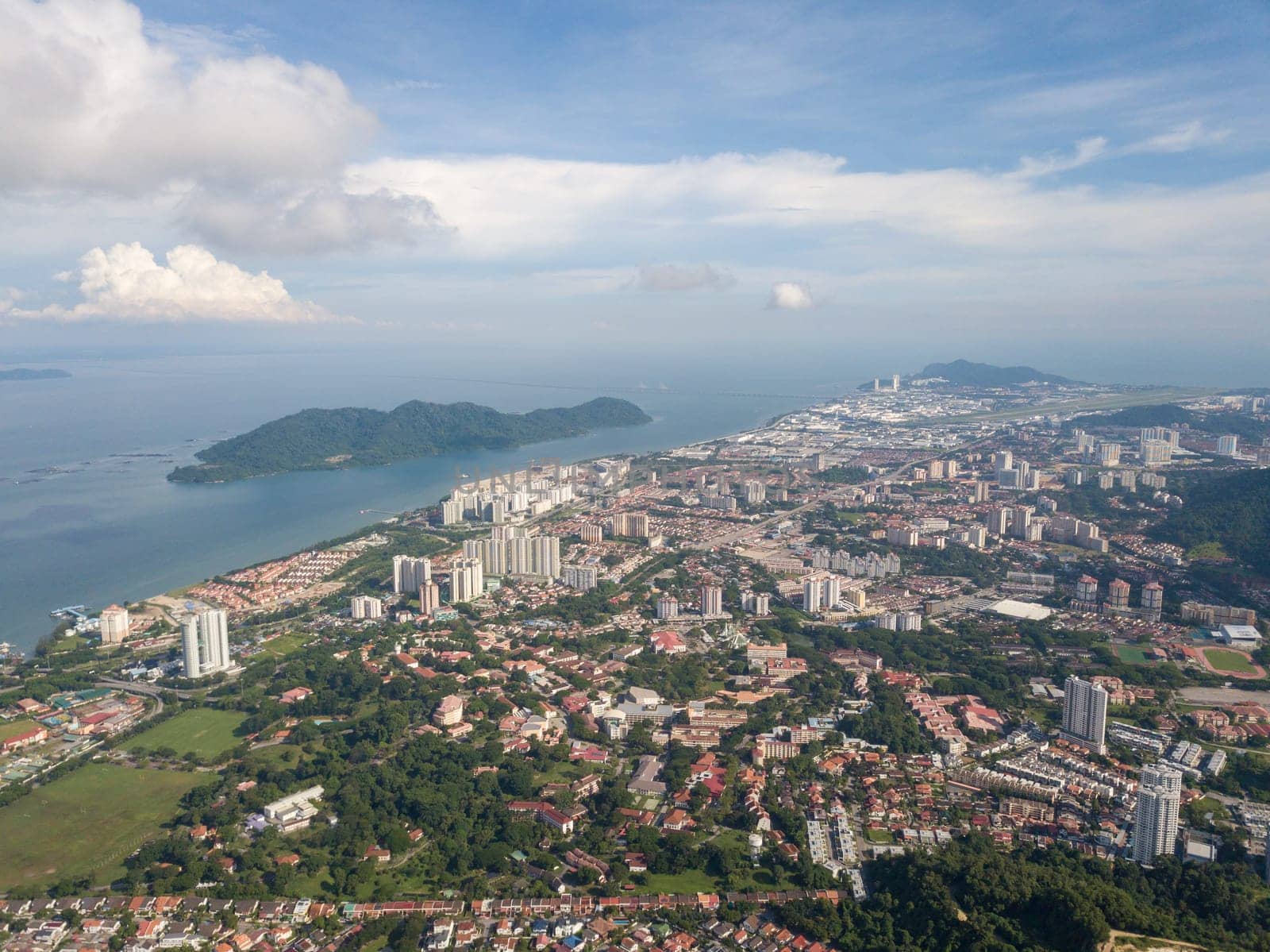 Georgetown, Penang/Malaysia - Jun 08 2019: Aerial view Sungai Dua town in blue cloud morning.