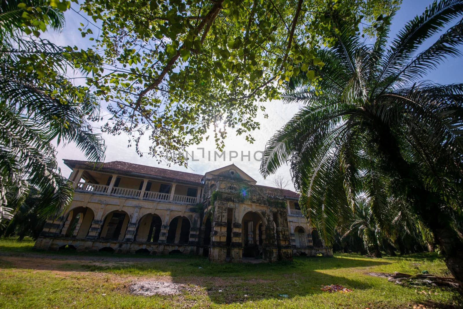 Nibong Tebal, Penang/Malaysia - Jun 28 2019: Colonial building 99 door mansion in oil palm estate.