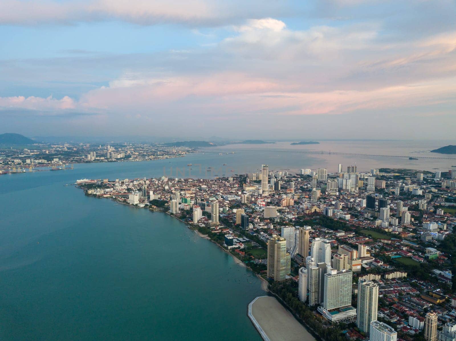 George Town, Penang/Malaysia - Aug 22 2019: Aerial view Gurney Drive to Georgetown in evening. Background is Penang Bridge.