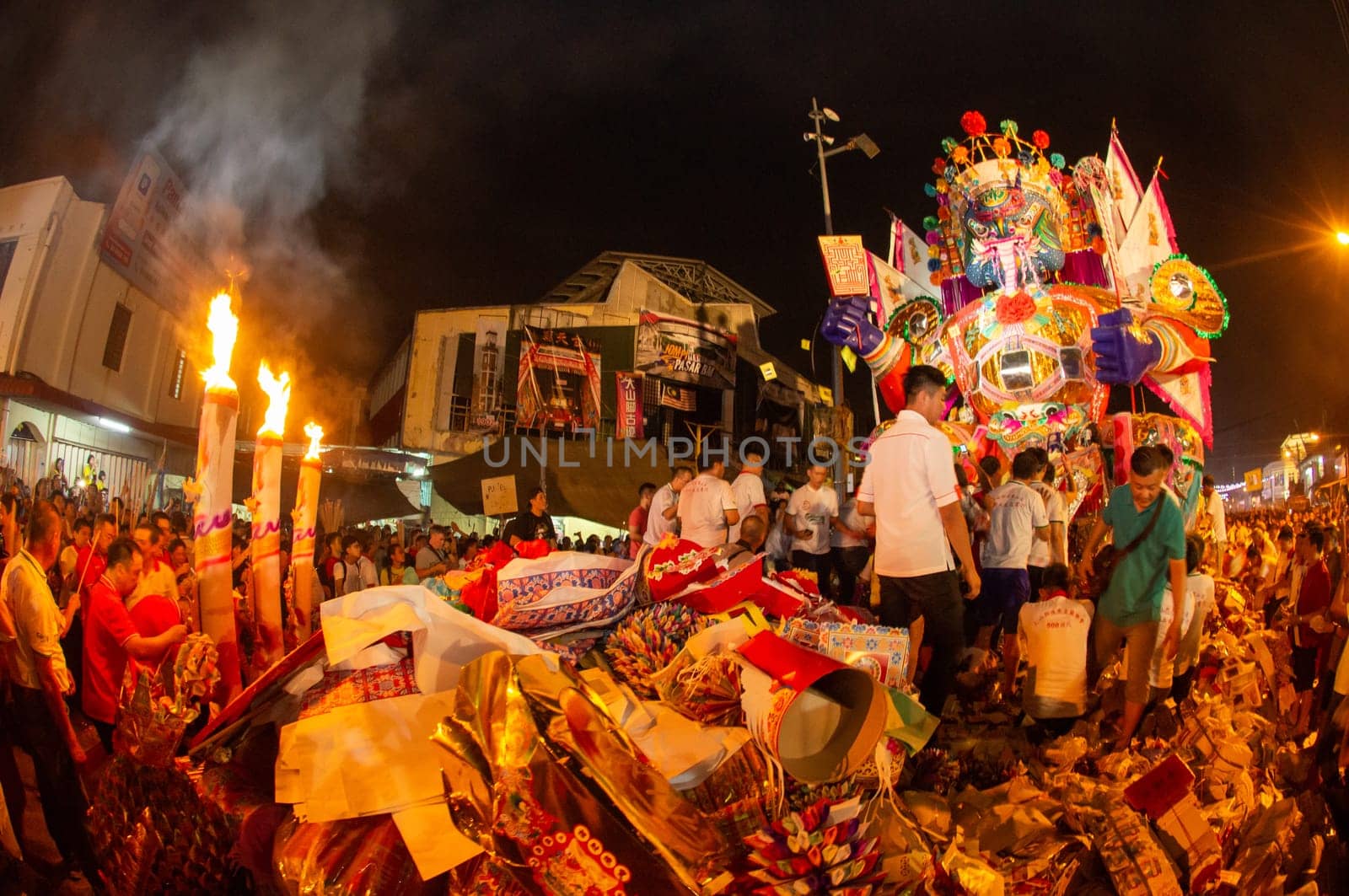 Bukit Mertajam, Penang/Malaysia - Aug 17 2019: People put statue ghost king on joss paper to be burnt together.