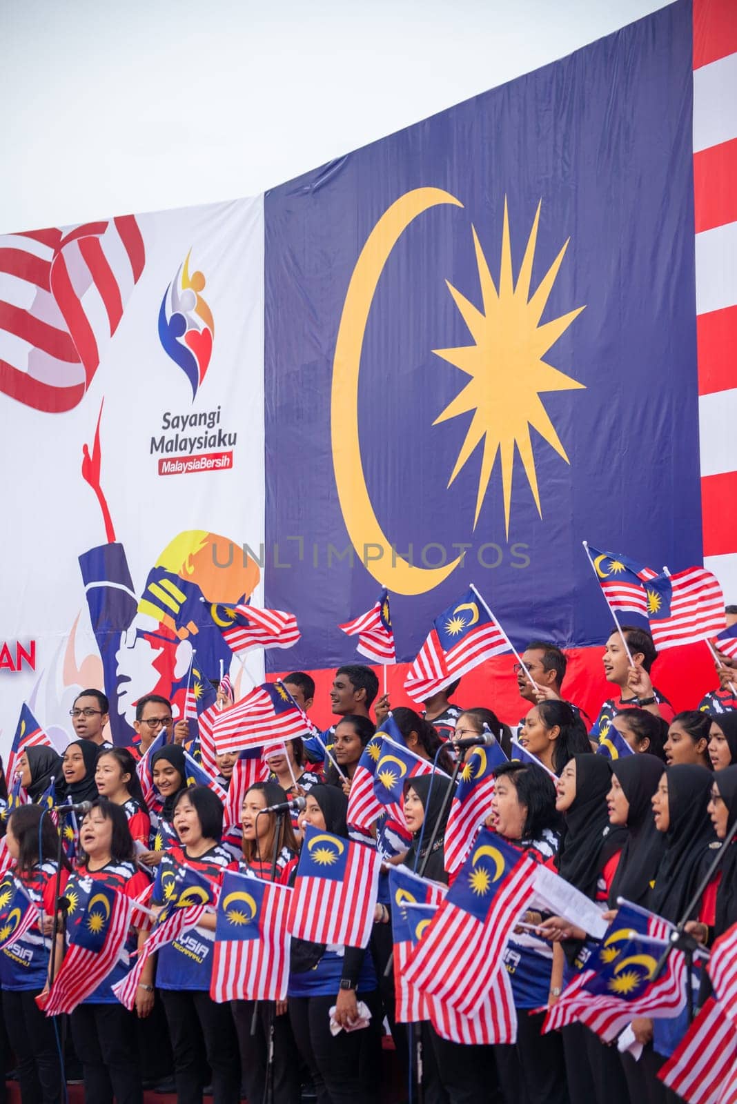 Butterworth, Penang/Malaysia - Aug 31 2019: Malaysian sing during Malaysia independence day celebration