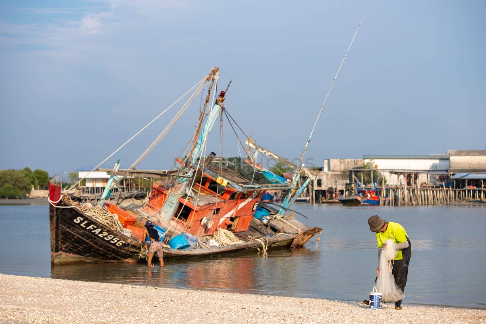 Sekinchan, Selangor/Malaysia - Oct 06 2019: A Malays fishing at the coastal.