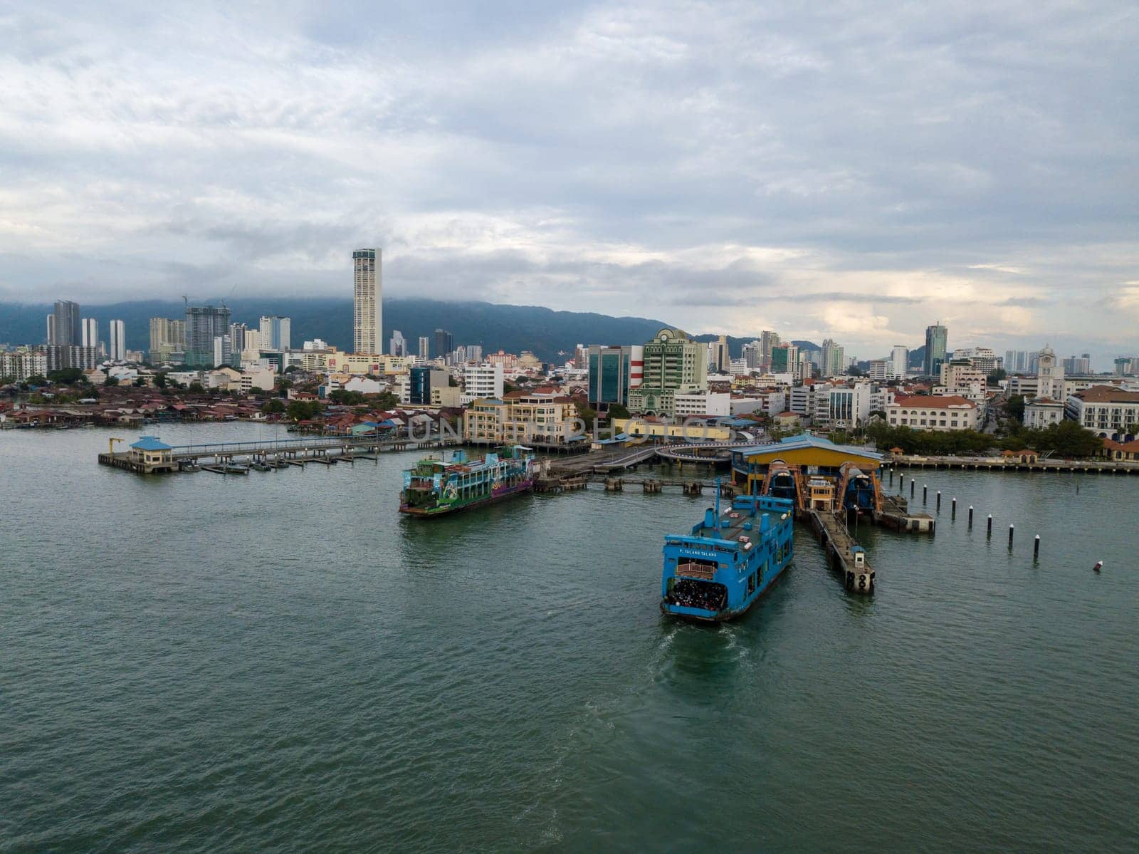George Town, Penang/Malaysia - Oct 23 2019: Blue ferry at terminal Georgetown.