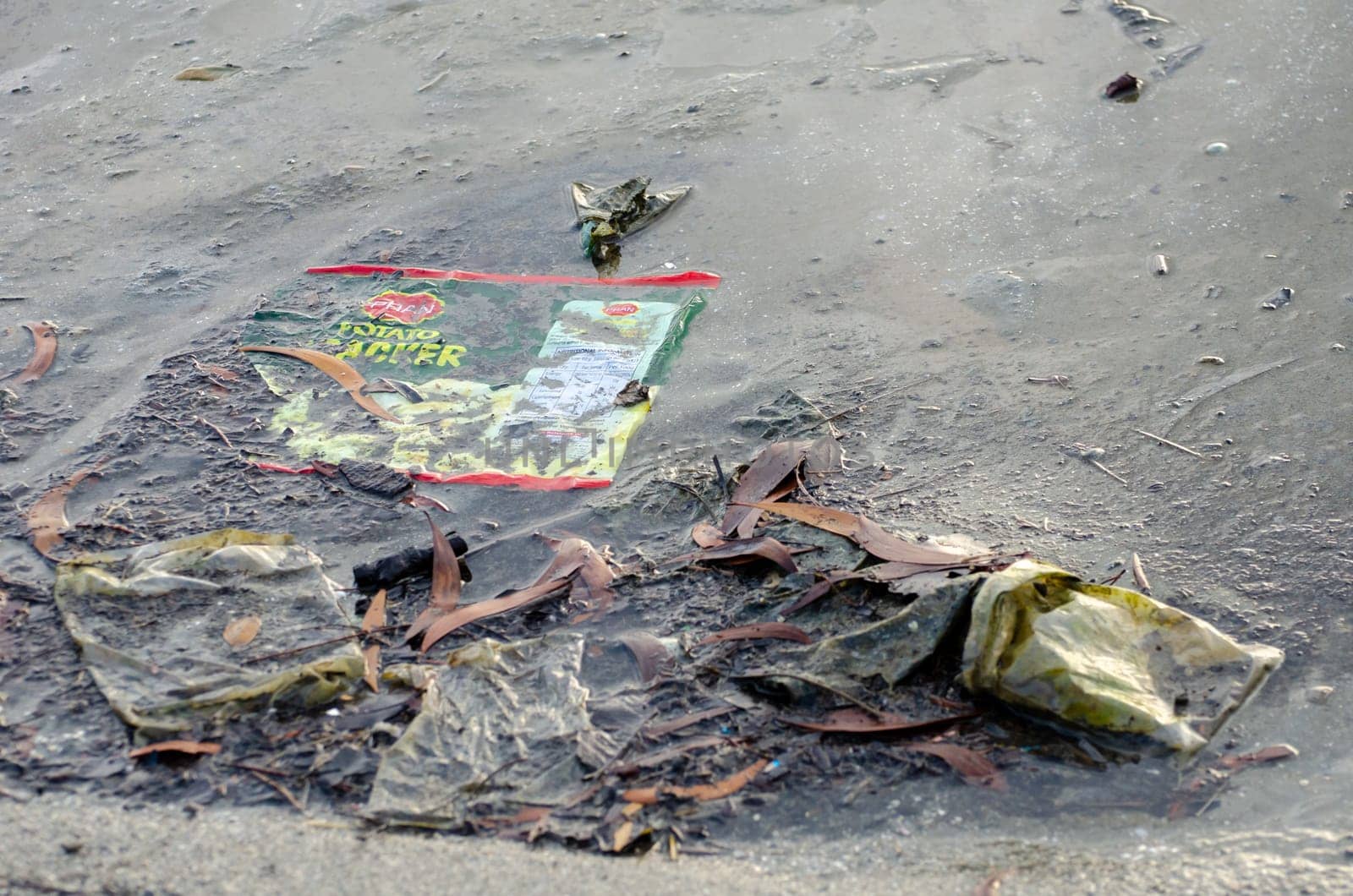 Batu Maung, Penang/Malaysia - Dec 28 2019: Food plastic found at sea coastal.