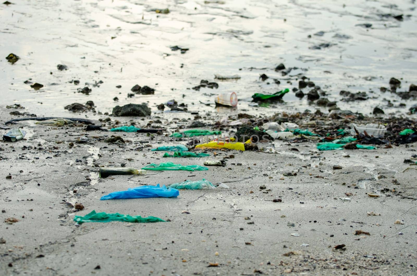 Batu Maung, Penang/Malaysia - Dec 28 2019: Plastic waste at sea coastal during low tide.
