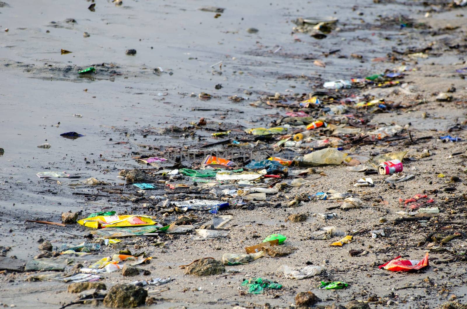 Batu Maung, Penang/Malaysia - Dec 28 2019: Rubbish at sea coastal during low tide.