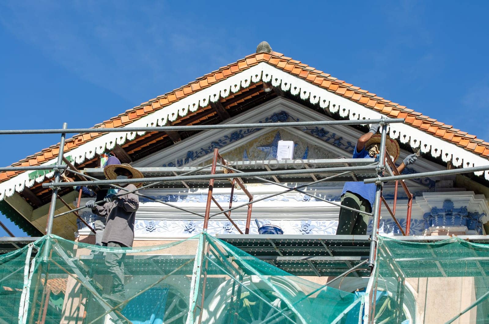 Georgetown, Penang/Malaysia - Jan 03 2020: Worker renovate heritage building is World UNESCO heritage site Georgetown.