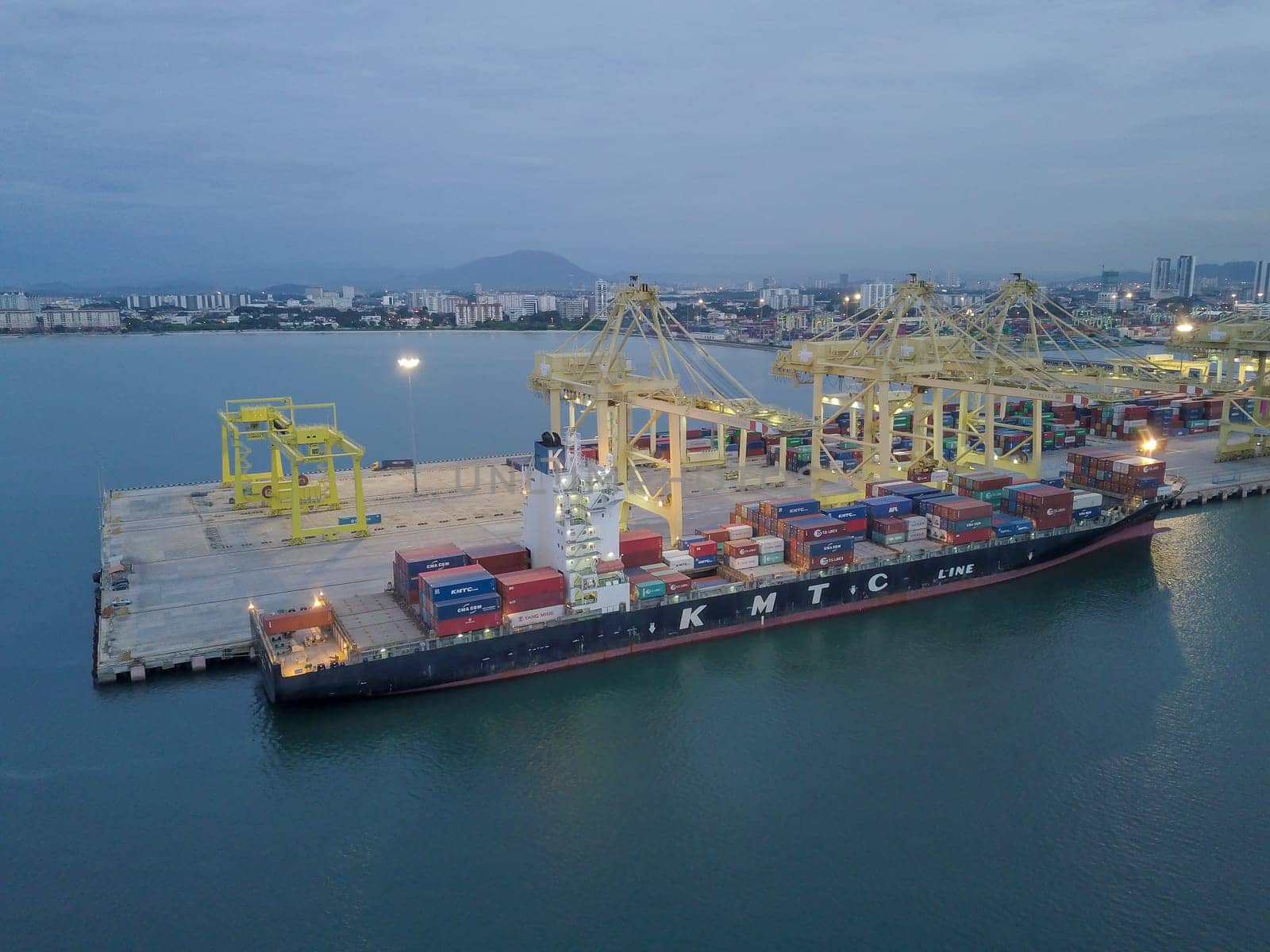 Butterworth, Penang/Malaysia - Nov 08 2019: Container ship in dusk hour.
