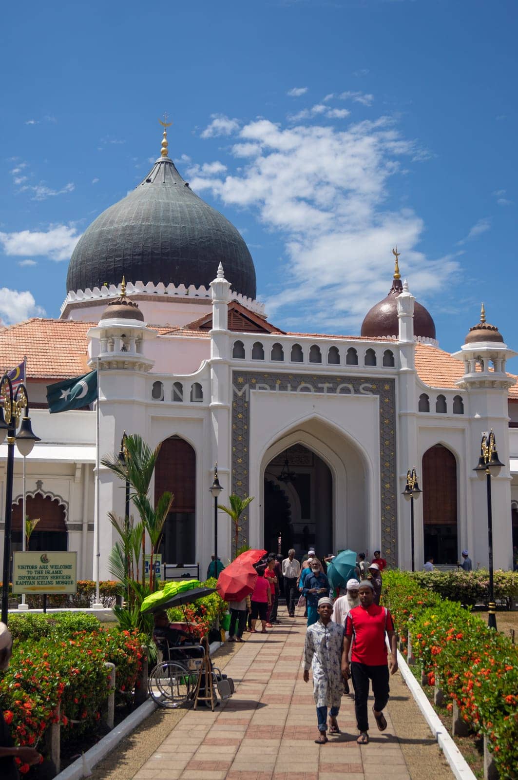Georgetown, Penang/Malaysia - Feb 14 2020: Muslim come out from Kapitan Keling Mosque after friday pray.