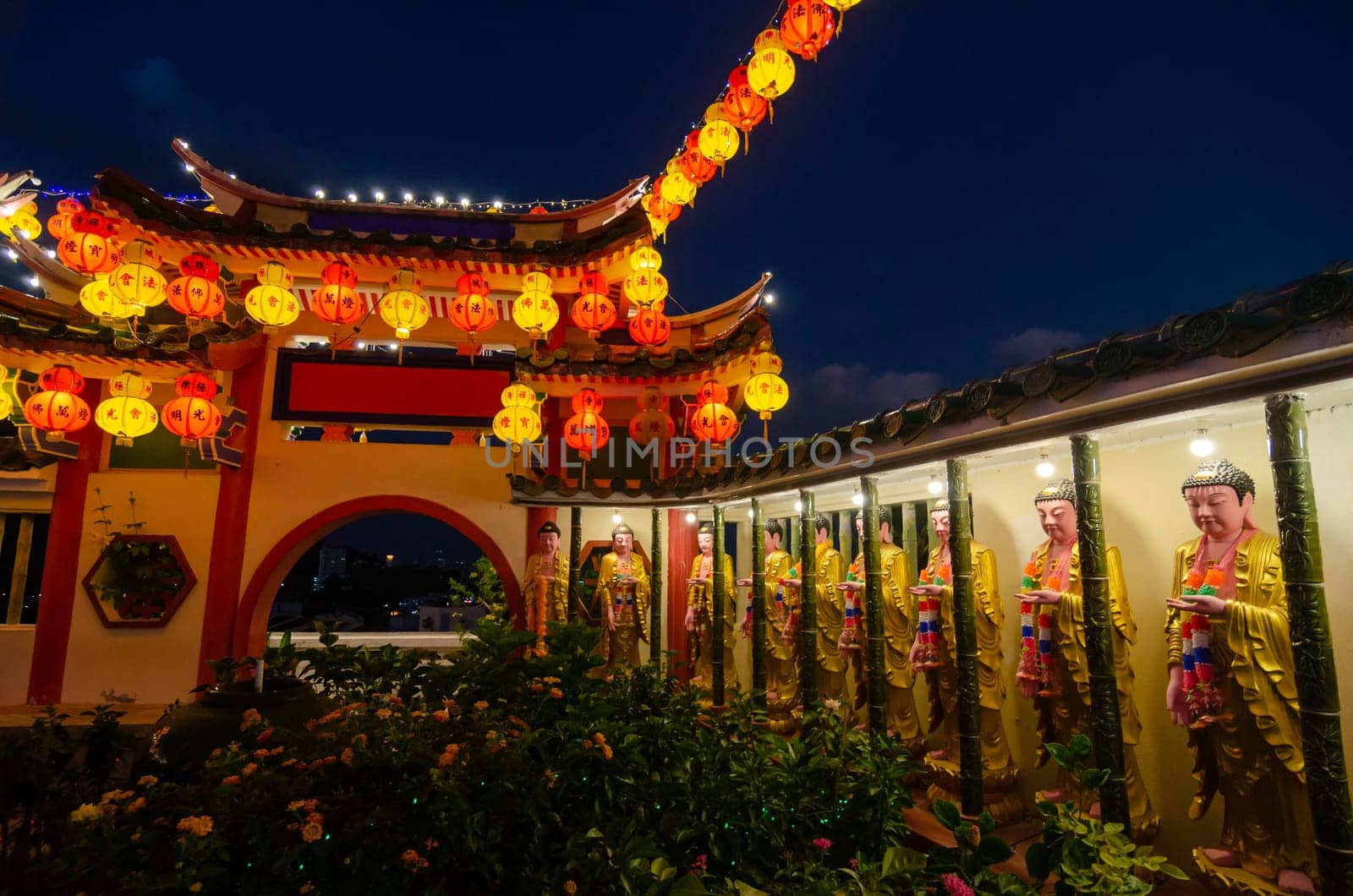 Georgetown, Penang/Malaysia - Feb 20 2020: Buddha statue during night light up at Kek Lok Si temple.