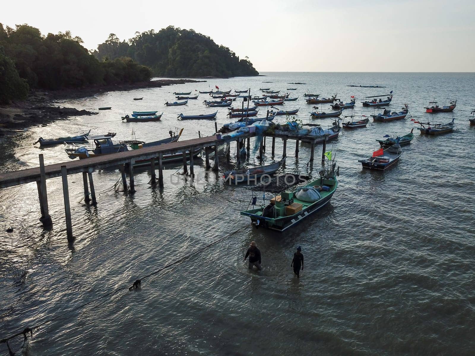 Pulau Sayak, Kedah/Malaysia - Feb 26 2020: Aerial view fishing jetty with boats parking.