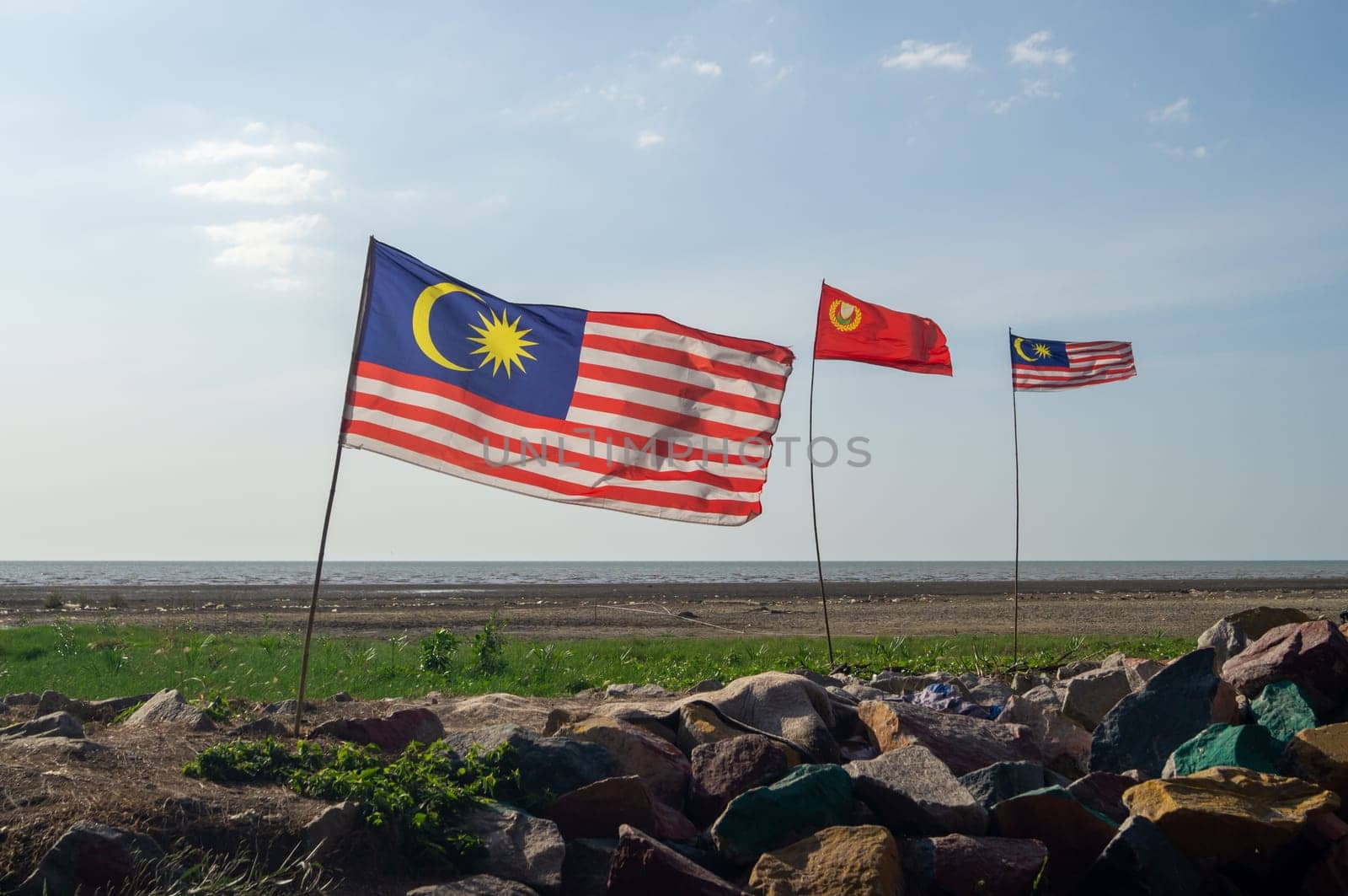 Pulau Sayak, Kedah/Malaysia - Feb 26 2020: Malaysia and Kedah flag waving by wind.