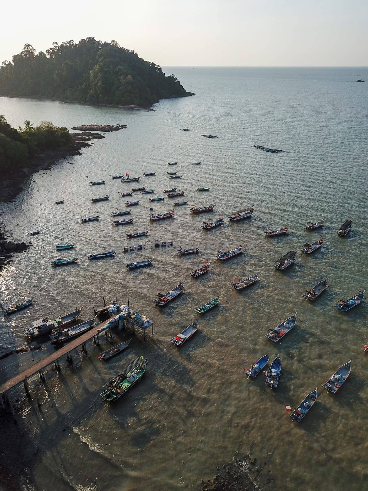 Pulau Sayak, Kedah/Malaysia - Feb 26 2020: Aerial view beautiful jetty with fishing boat.