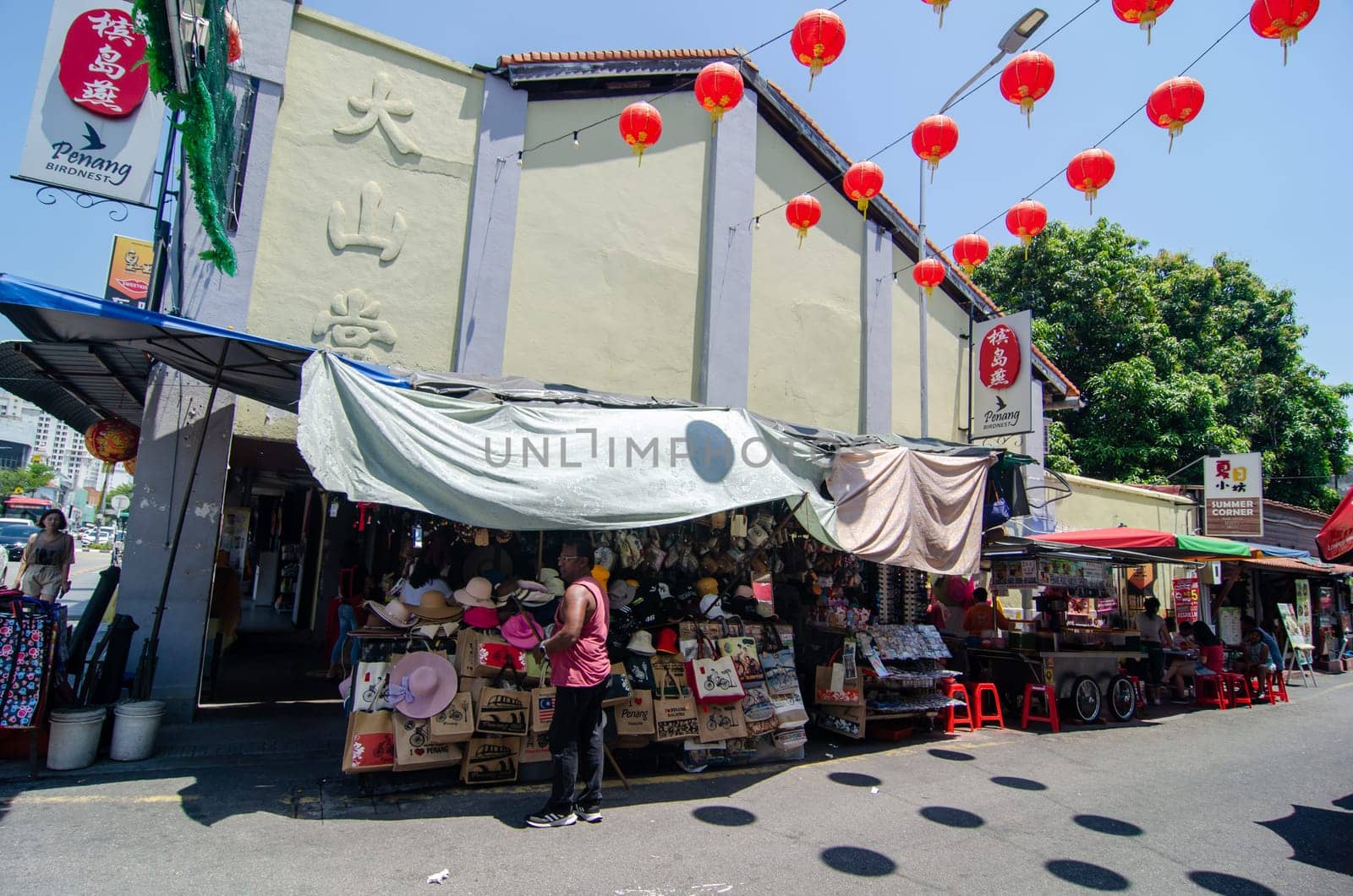 Georgetown, Penang/Malaysia - Feb 27 2020: Hat hawker at Lebuh Keng Kwee.