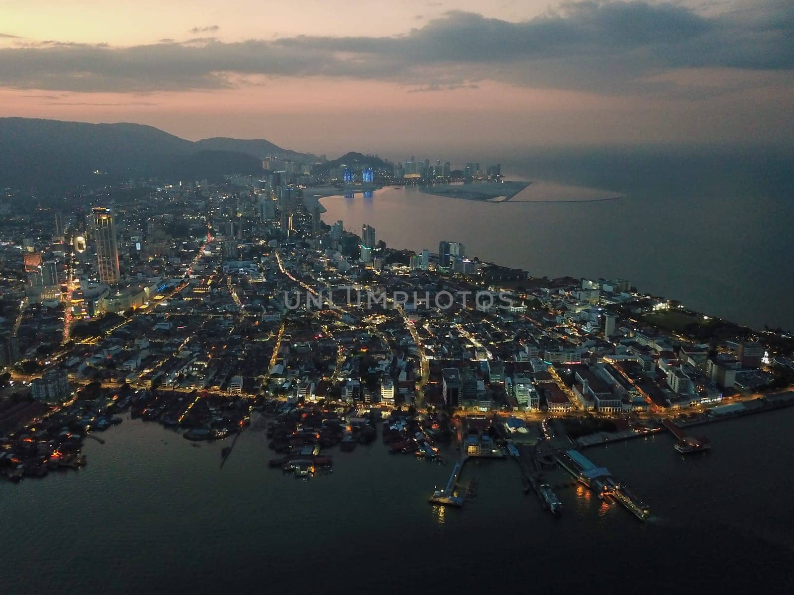 Georgetown, Penang/Malaysia - Feb 28 2020: Ferry terminal and penang Georgetown at night.