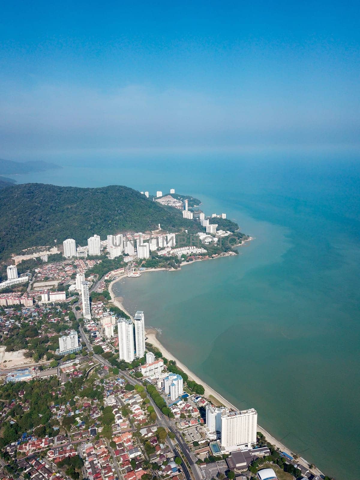 Georgetown, Penang/Malaysia - Mar 03 2020: Aerial view tall building near coastal at Tanjung Bungah.
