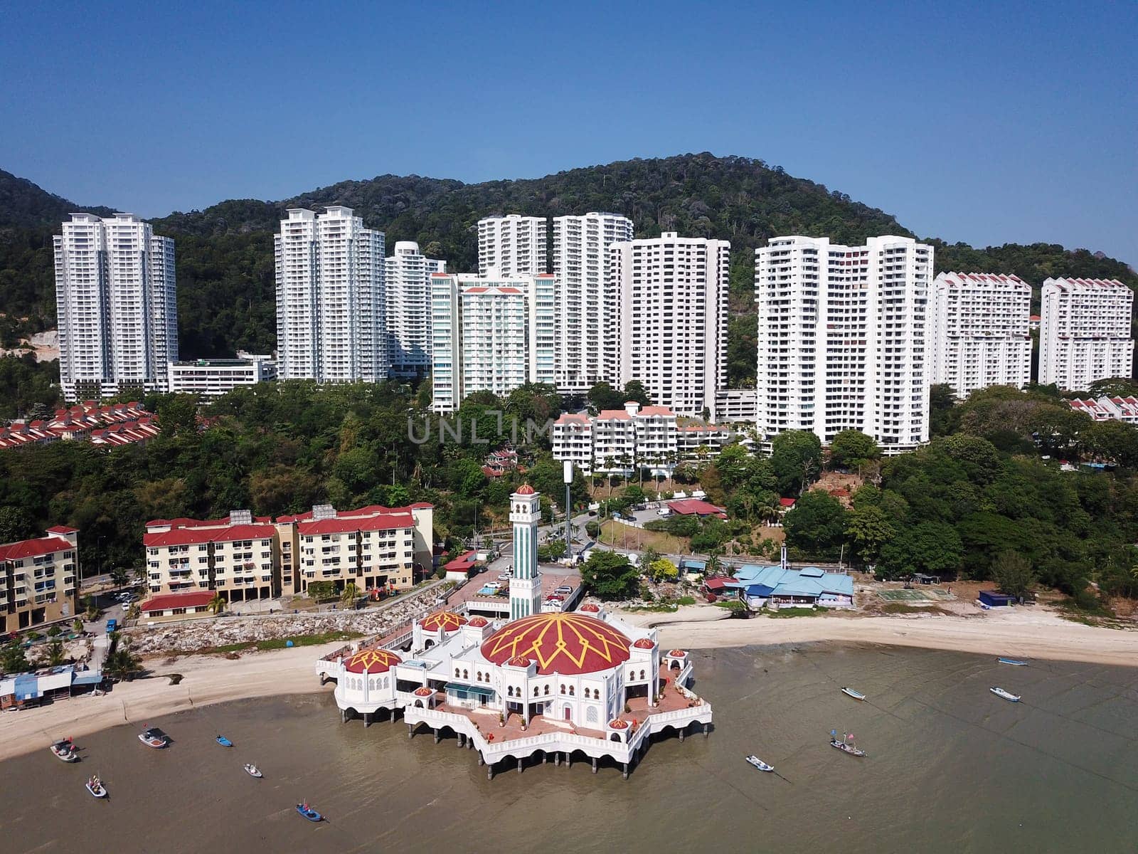 Georgetown, Penang/Malaysia - Mar 03 2020: Aerial view floating mosque and the development construction at Tanjung Bungah.