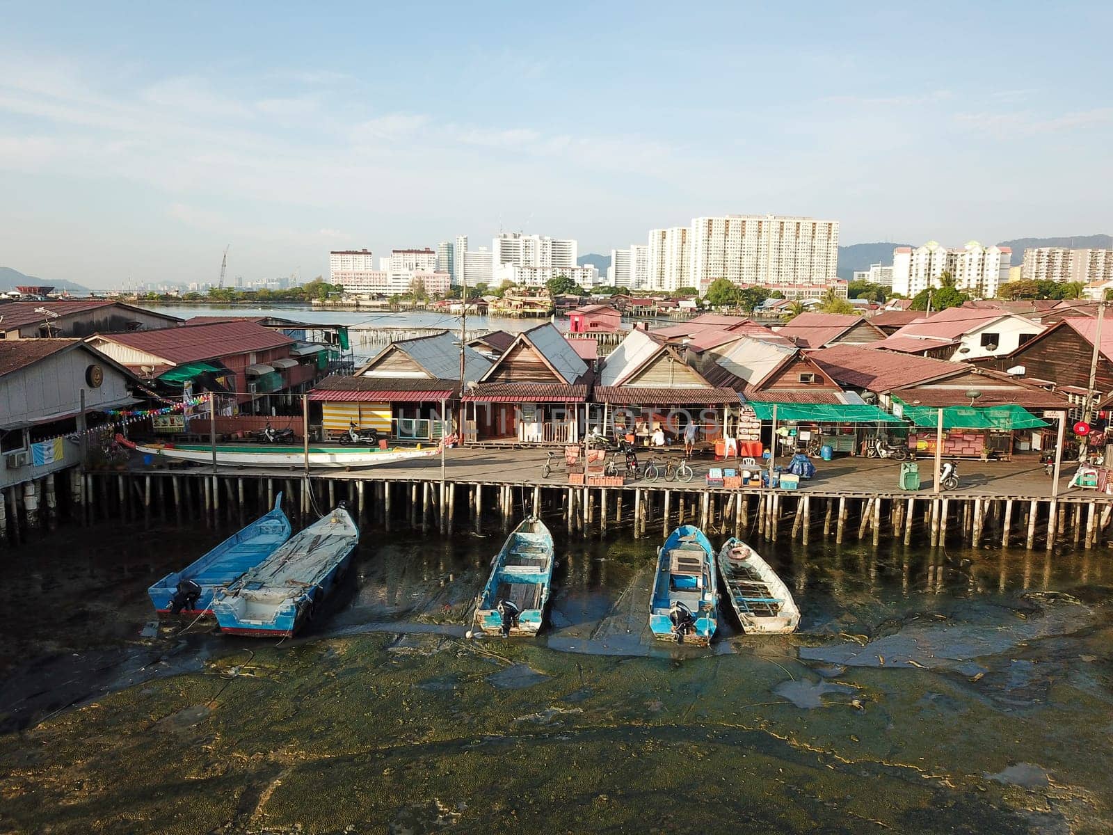 Georgetown, Penang/Malaysia - Feb 28 2020: Chew Jetty wooden bridge and house on water.
