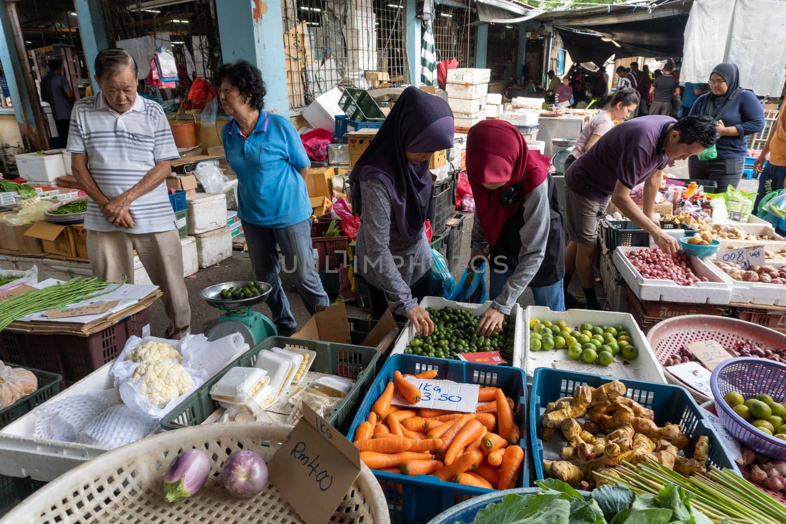 Bukit Mertajam, Penang/Malaysia - Mar 08 2020: Local buy vegetables at morning market.