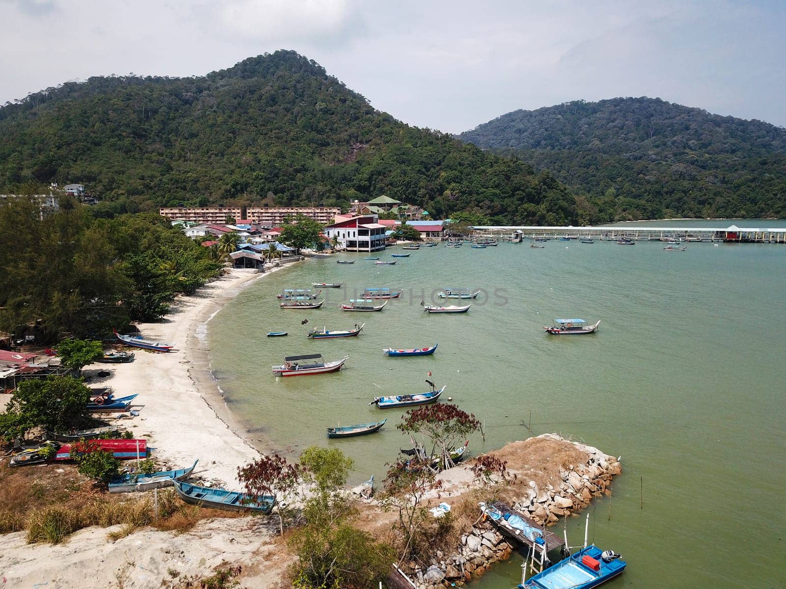 Teluk Bahang, Penang/Malaysia - Mar 08 2020: Boat park at coastal seashore Teluk Bahang.