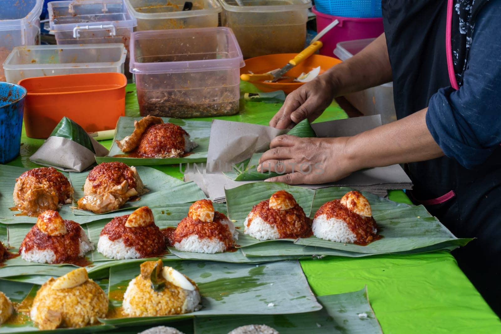 Bukit Mertajam, Penang/Malaysia - Mar 08 2020: Preparation nasi lemak.
