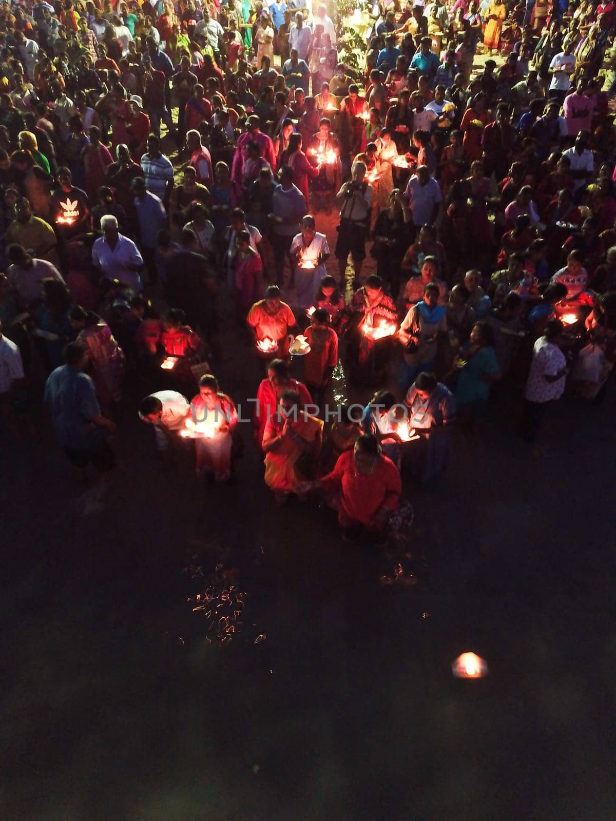 Teluk Bahang, Penang/Malaysia - Mar 08 2020: Devotees release lamp to sea at Sri Singamuga Kaliamman Temple
