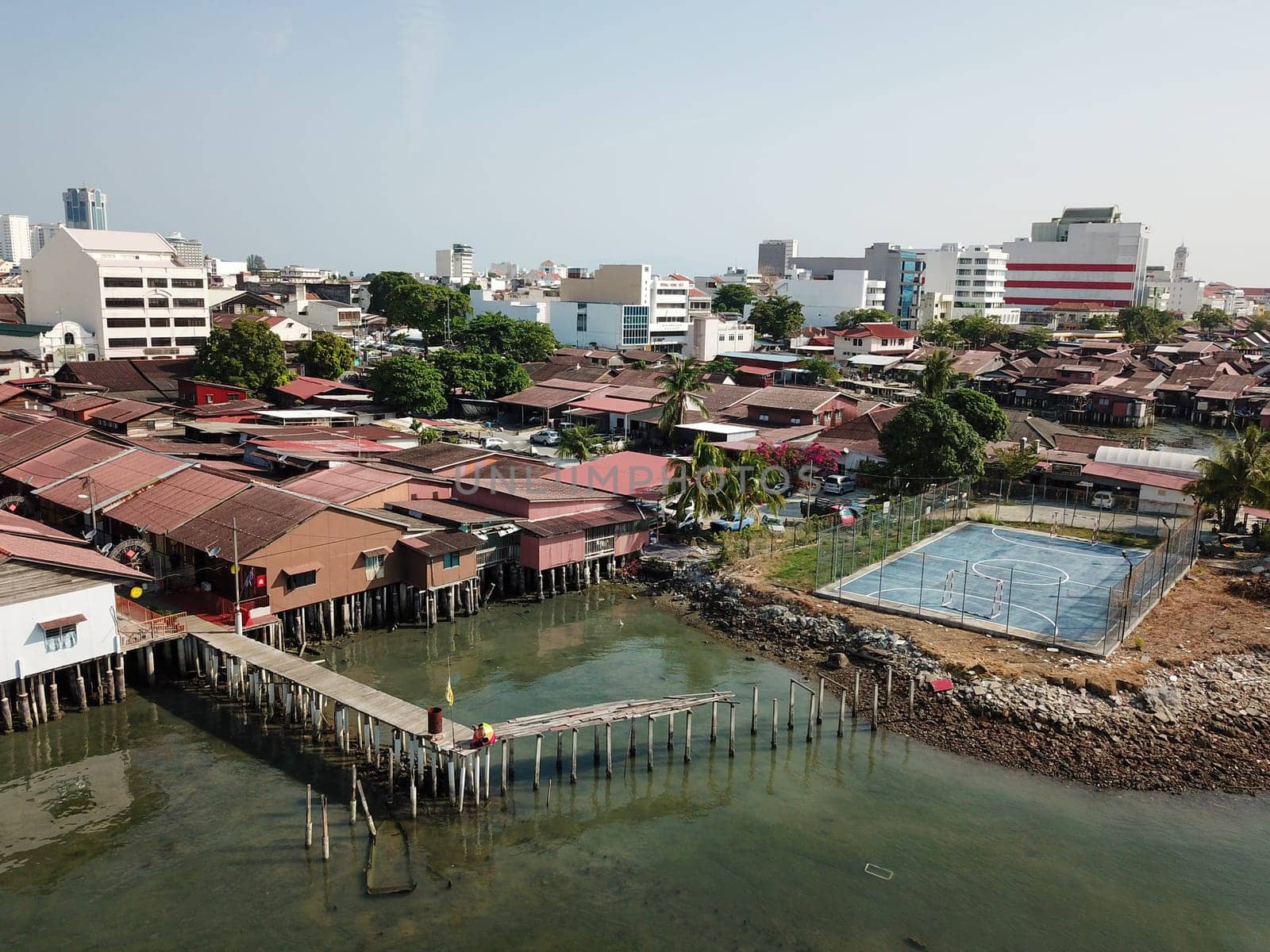 Georgetown, Penang/Malaysia - Mar 17 2020: Drone view basketball field near clan jetty.