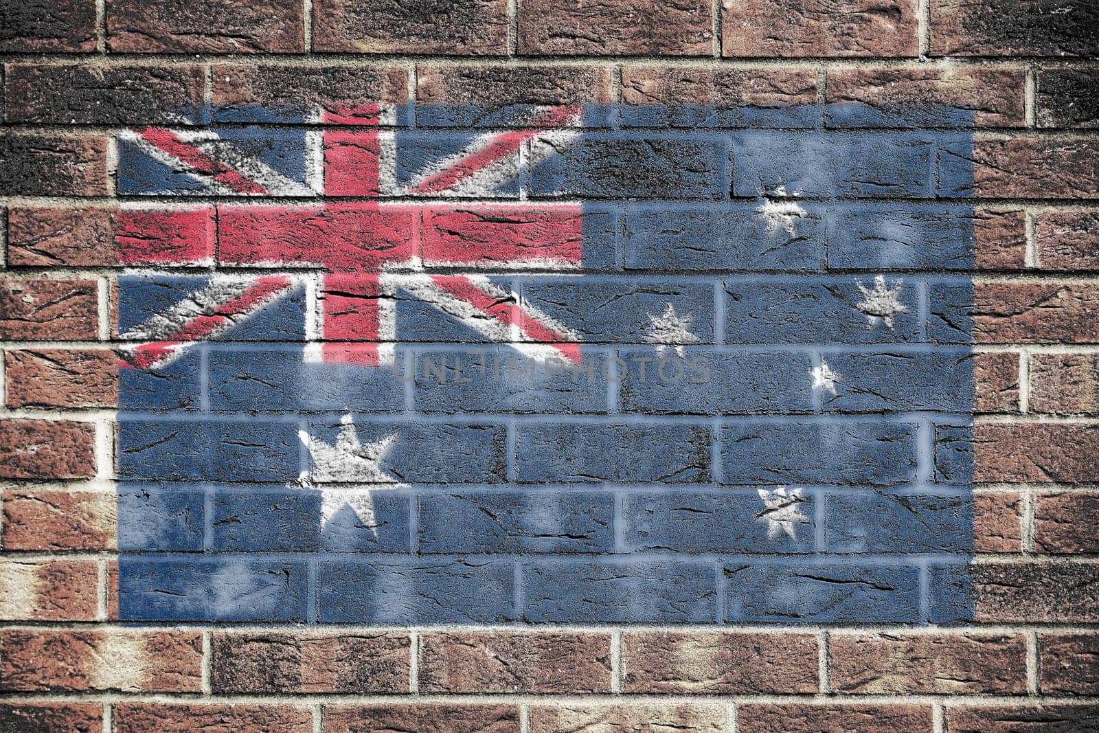 An Australia flag on a brick wall background