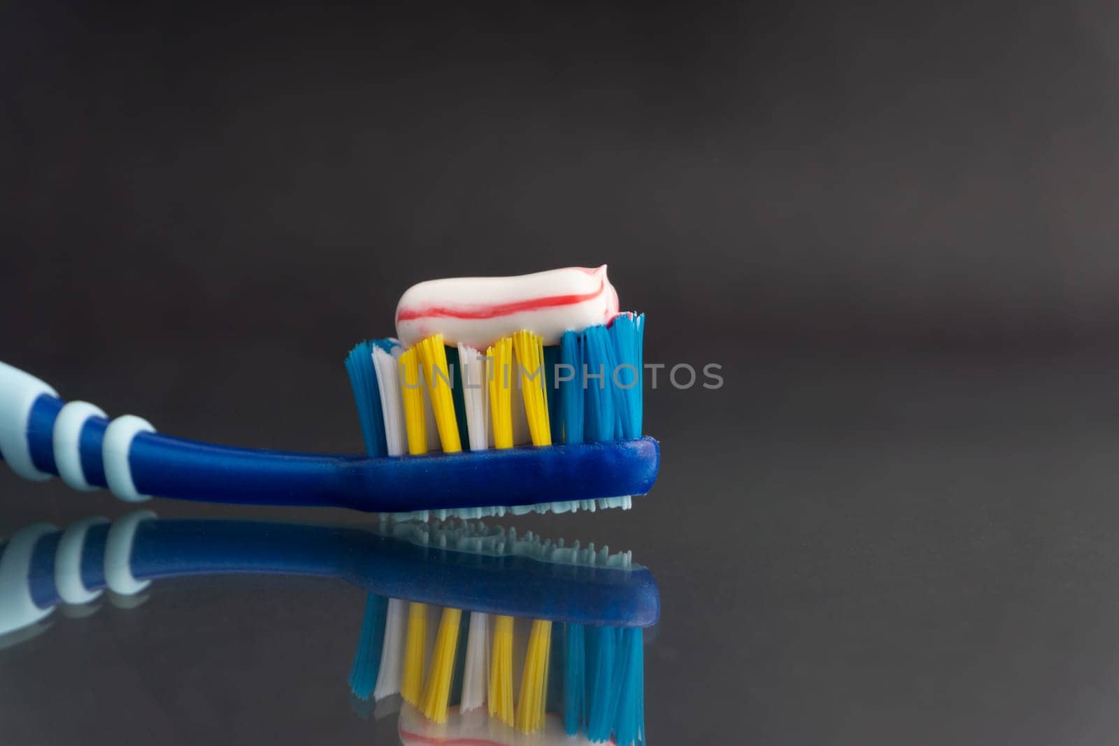 Toothbrush closeup on white background. Healthy concept