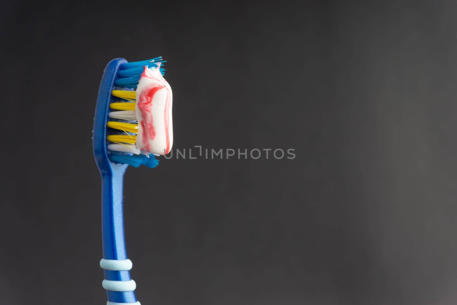 Toothbrush closeup on white background. Healthy concept