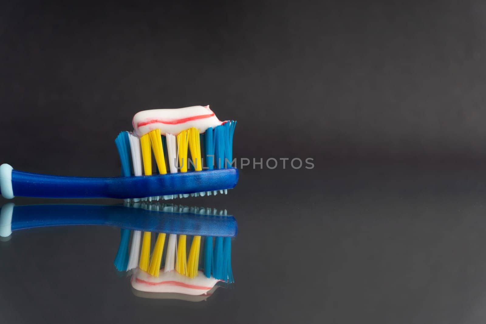 Toothbrush closeup on white background. Healthy concept