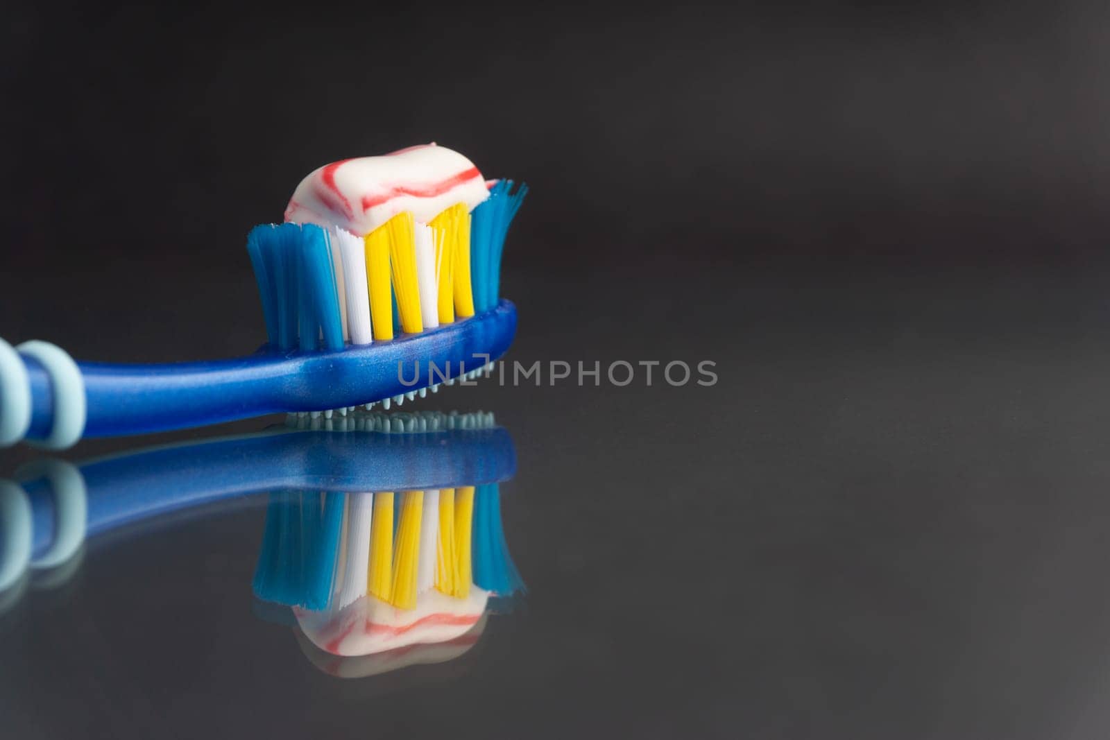 Toothbrush closeup on white background. Healthy concept