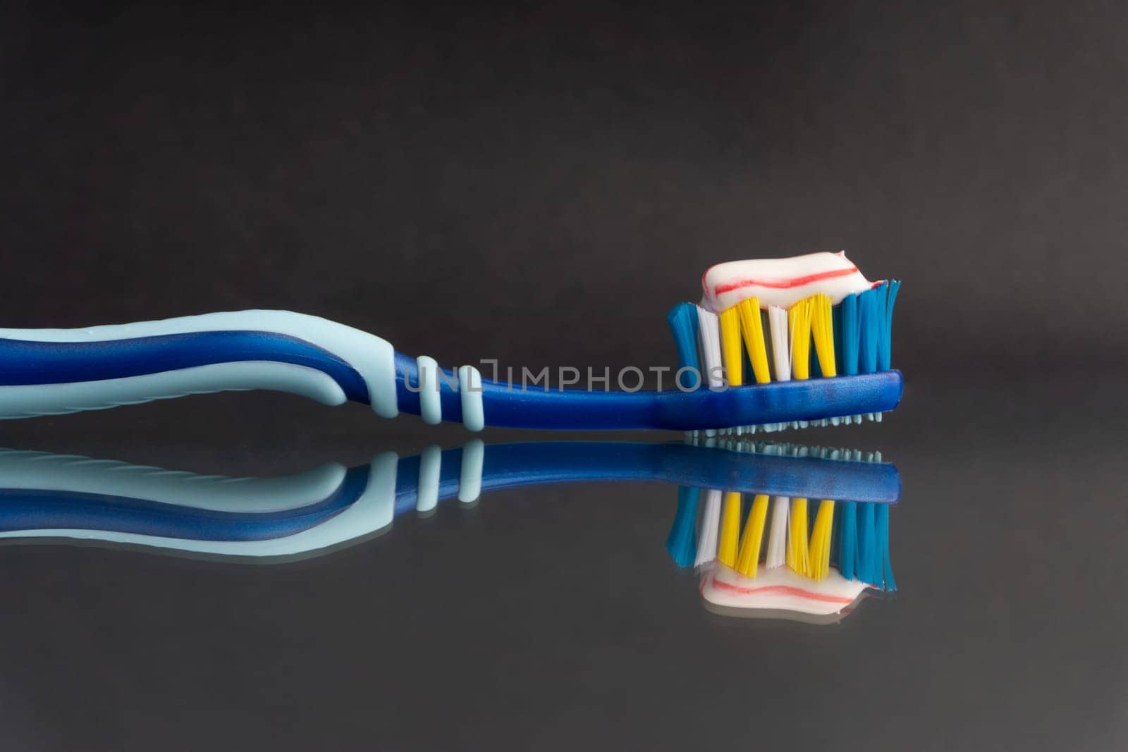 Toothbrush closeup on white background. Healthy concept