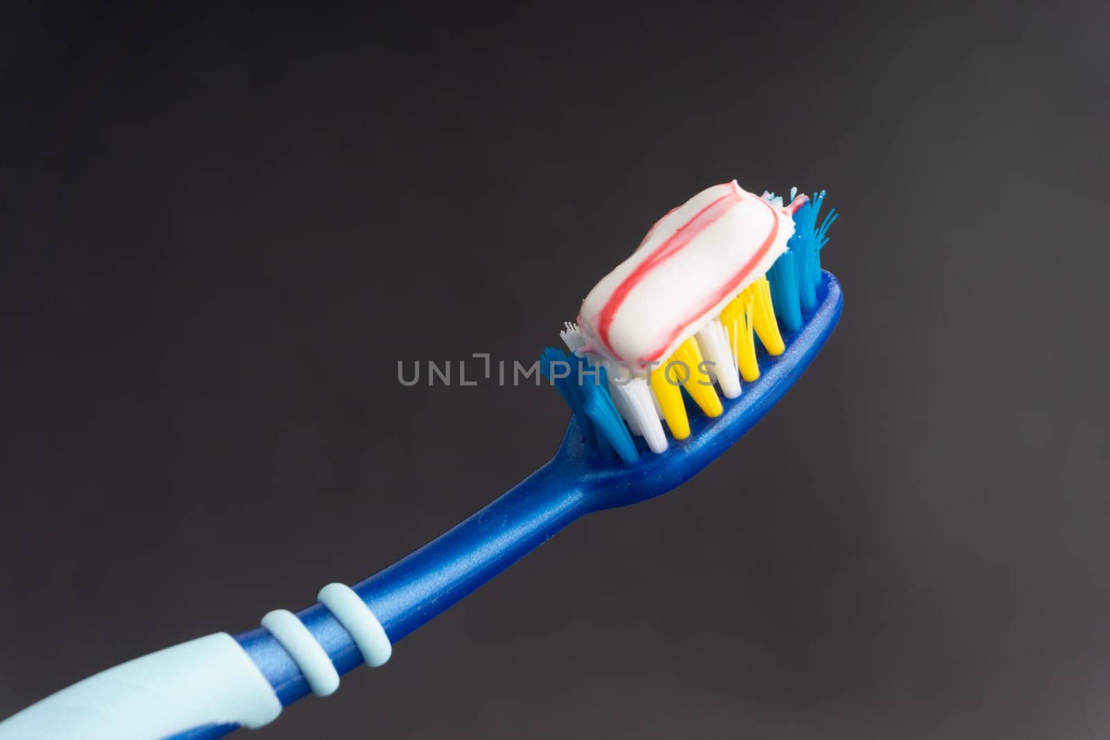 Toothbrush closeup on white background. Healthy concept