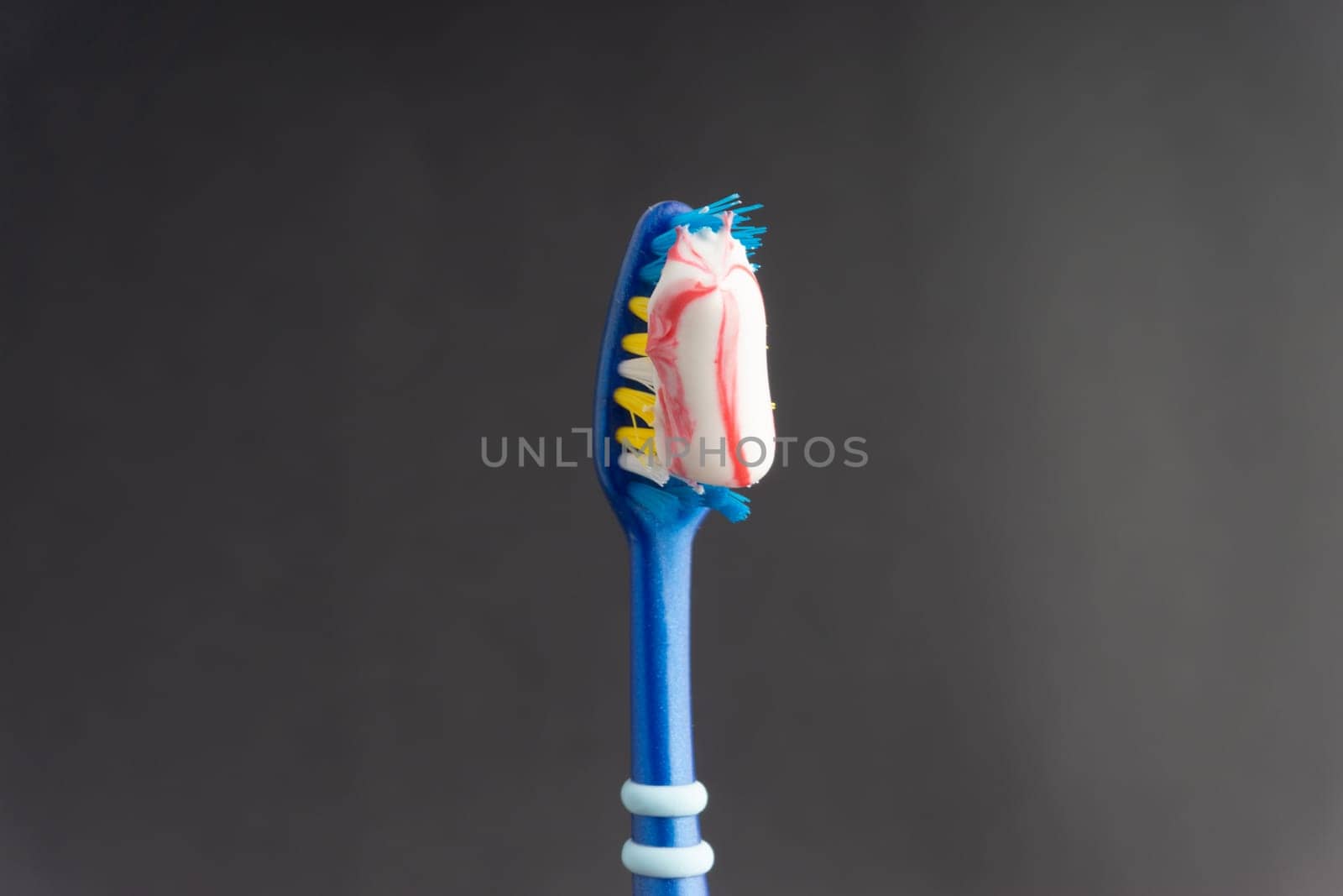 Toothbrush closeup on white background. Healthy concept