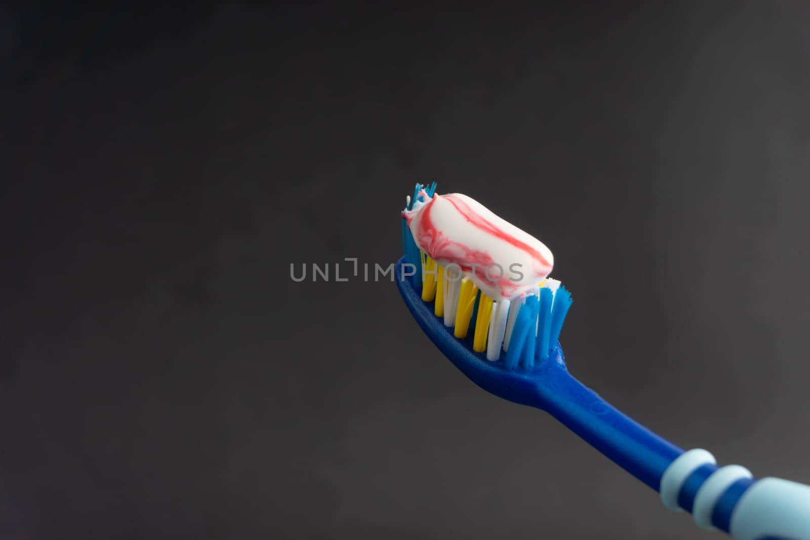 Toothbrush closeup on white background. Healthy concept