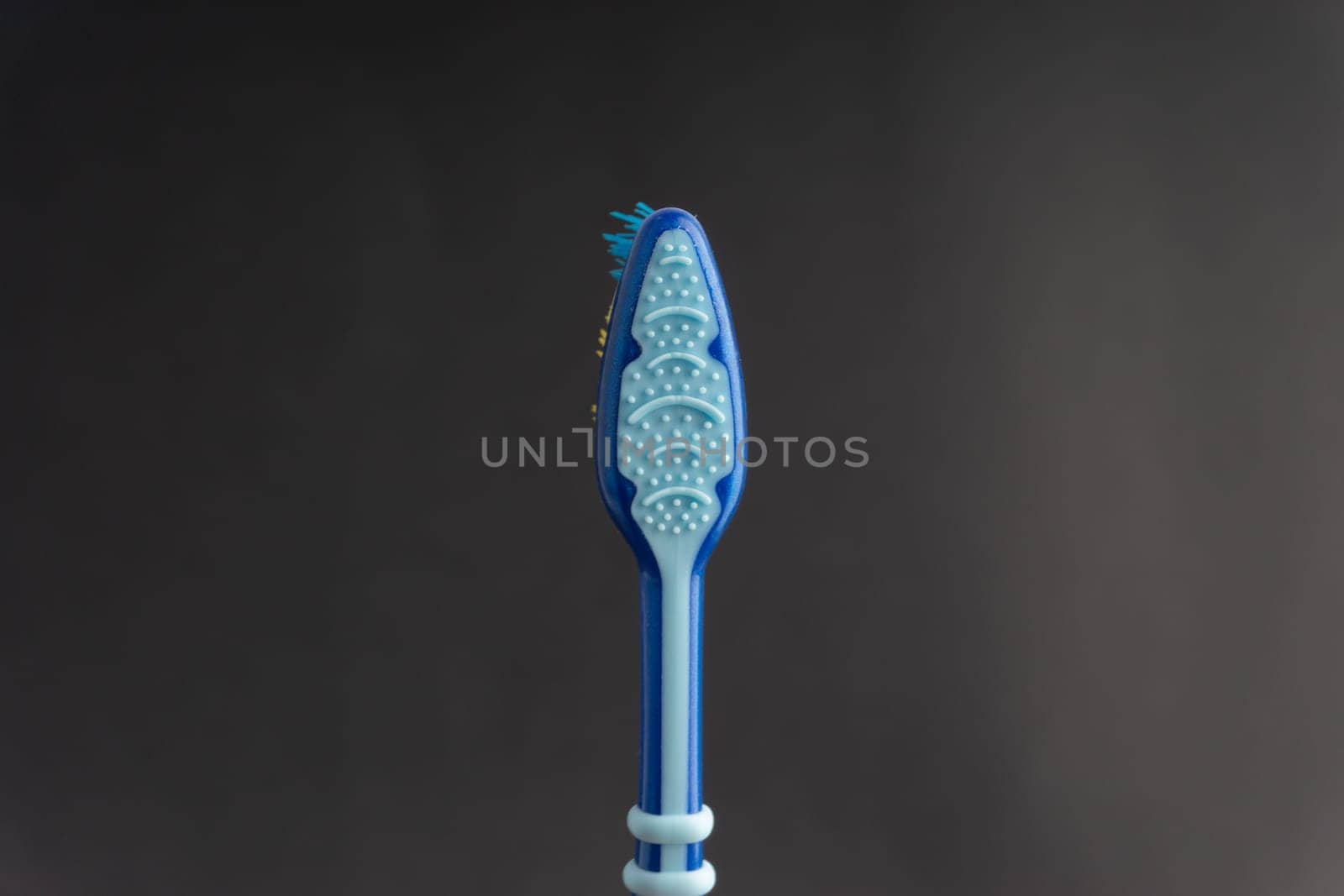 Toothbrush closeup on white background. Healthy concept