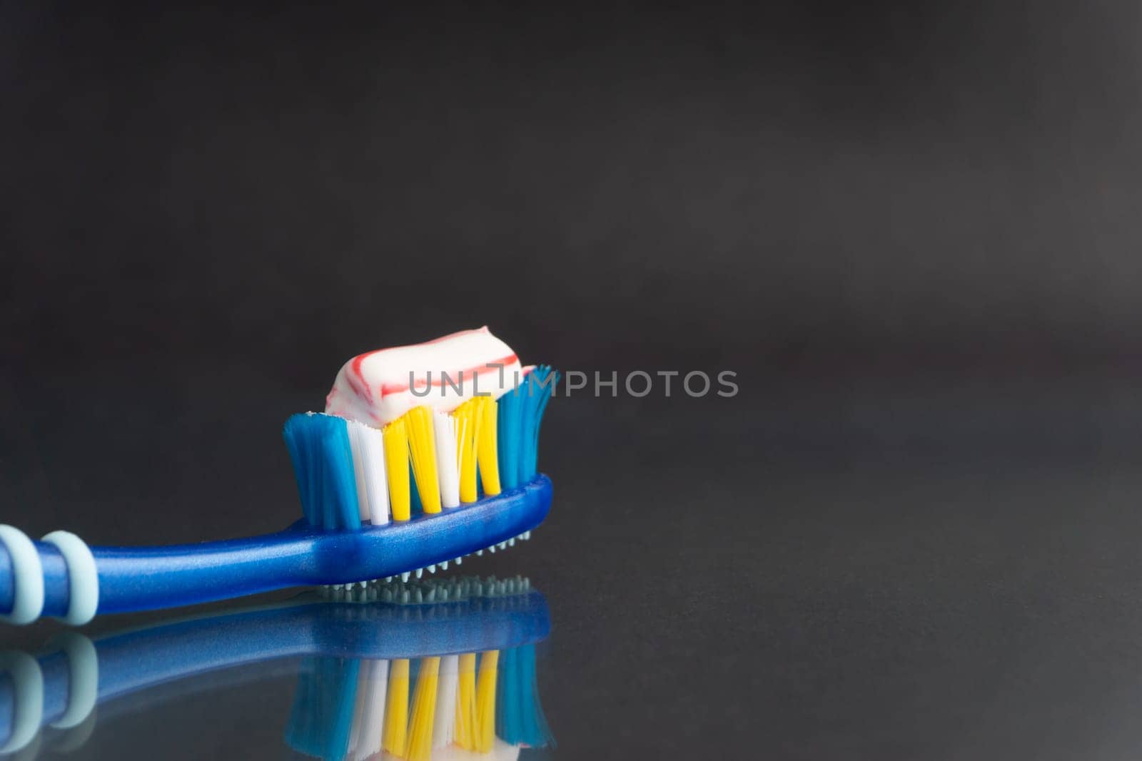 Toothbrush closeup on white background. Healthy concept
