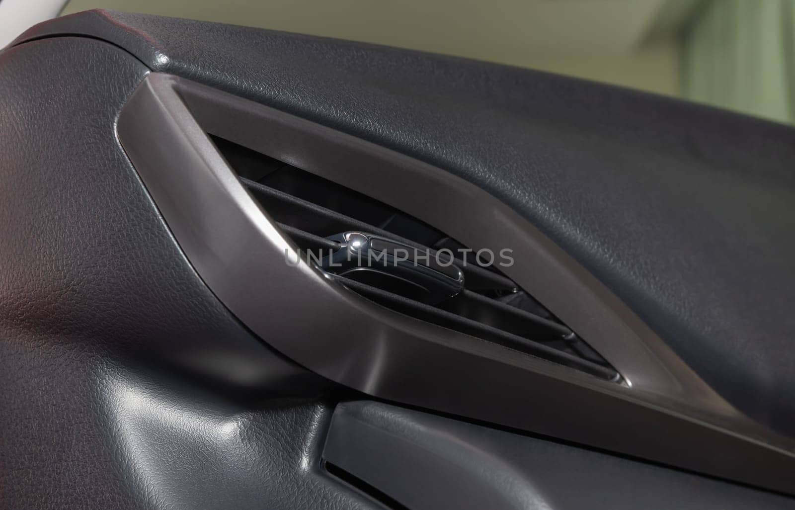 Modern Car Air Vent in Car Interior in Low Angle View