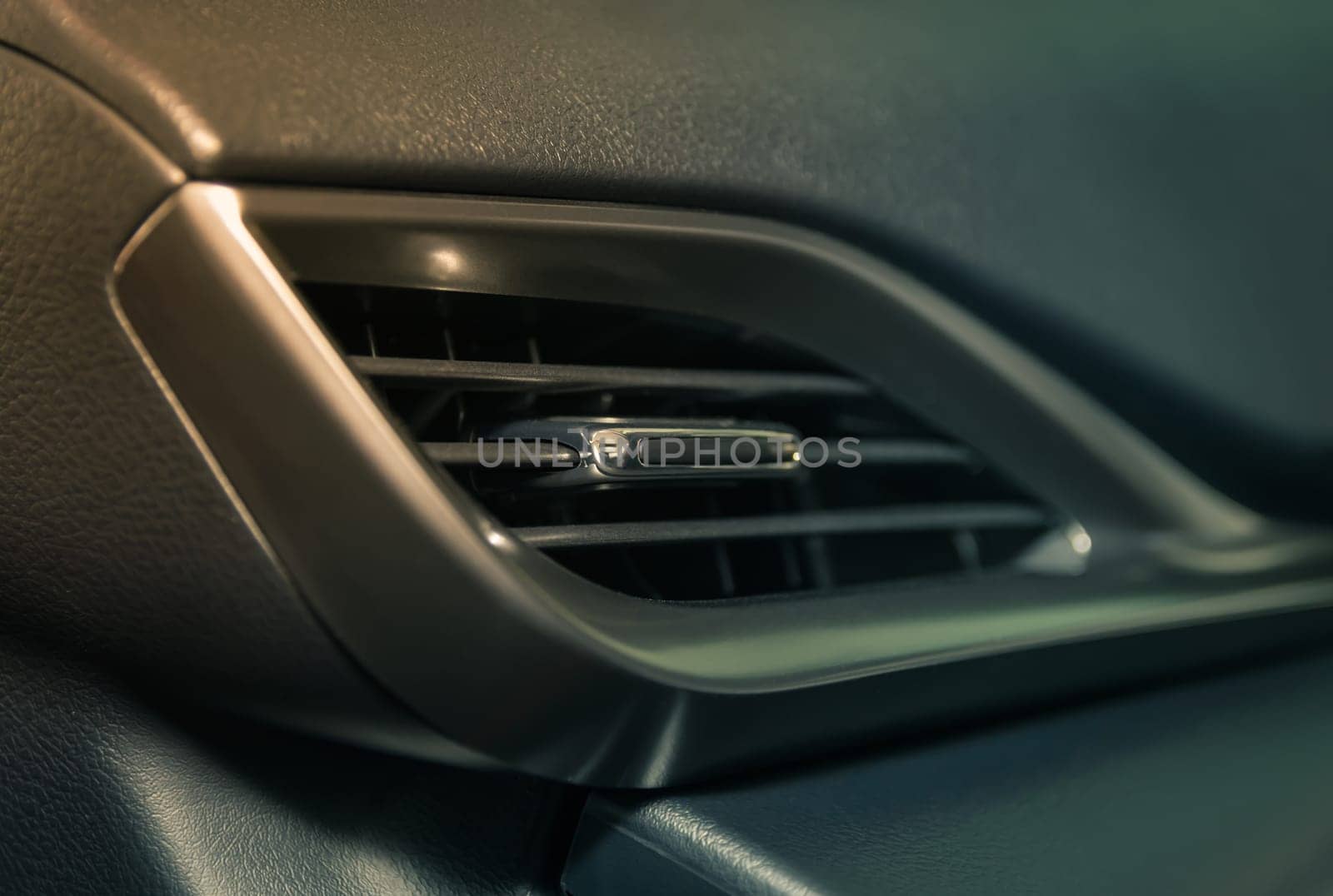 Modern Car Air Vent in Car Interior on Zoom View in Vintage Tone