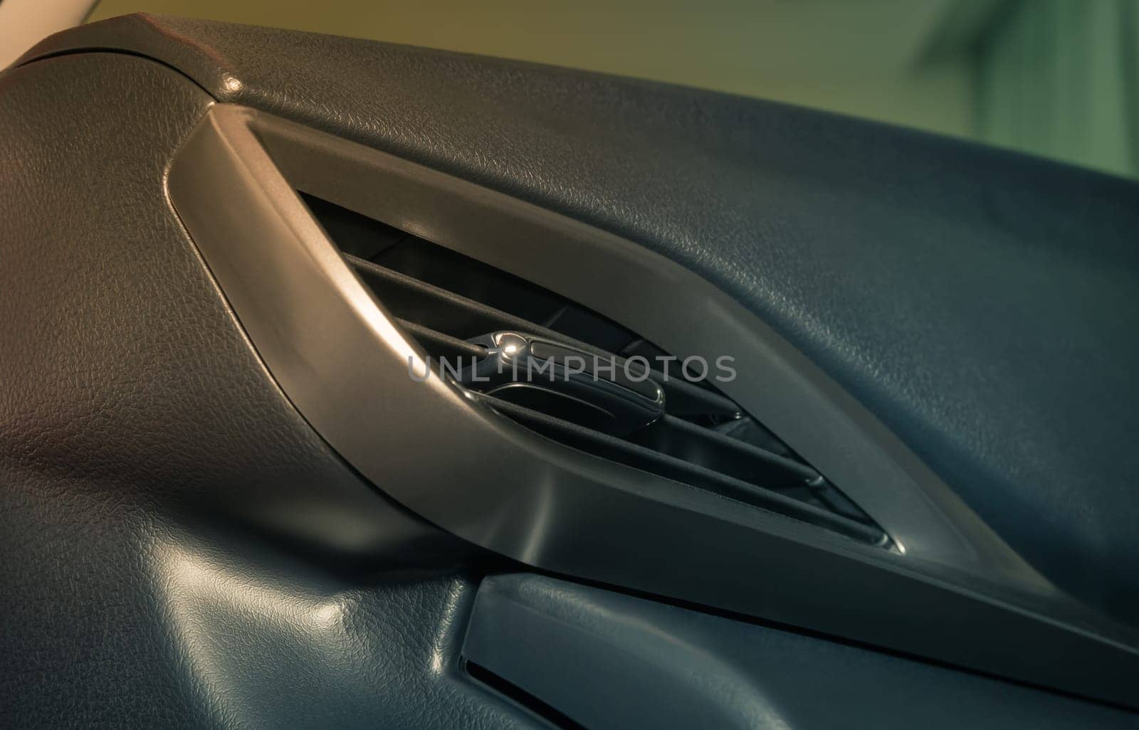 Modern Car Air Vent in Car Interior in Low Angle View in Vintage Tone