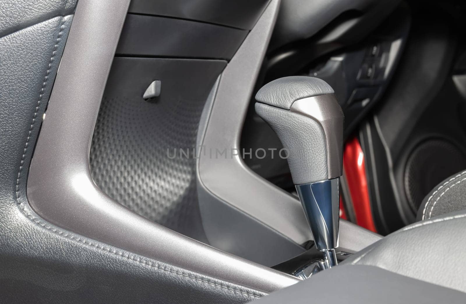 Gray Automatic Gear Handle in Car Interior on Right Frame with Front Seat
