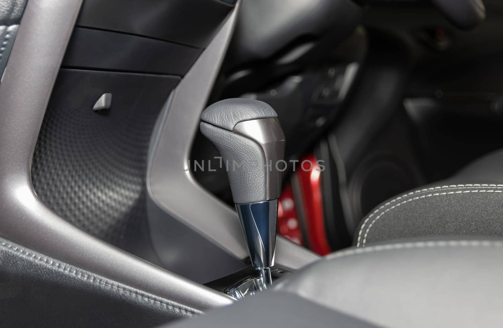 Gray Automatic Gear Handle in Car Interior on Center Frame