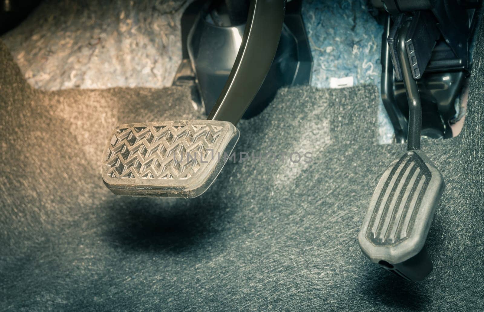 Brake Pedal and Accelerator Pedal of Car in Zoom View in Vintage Tone