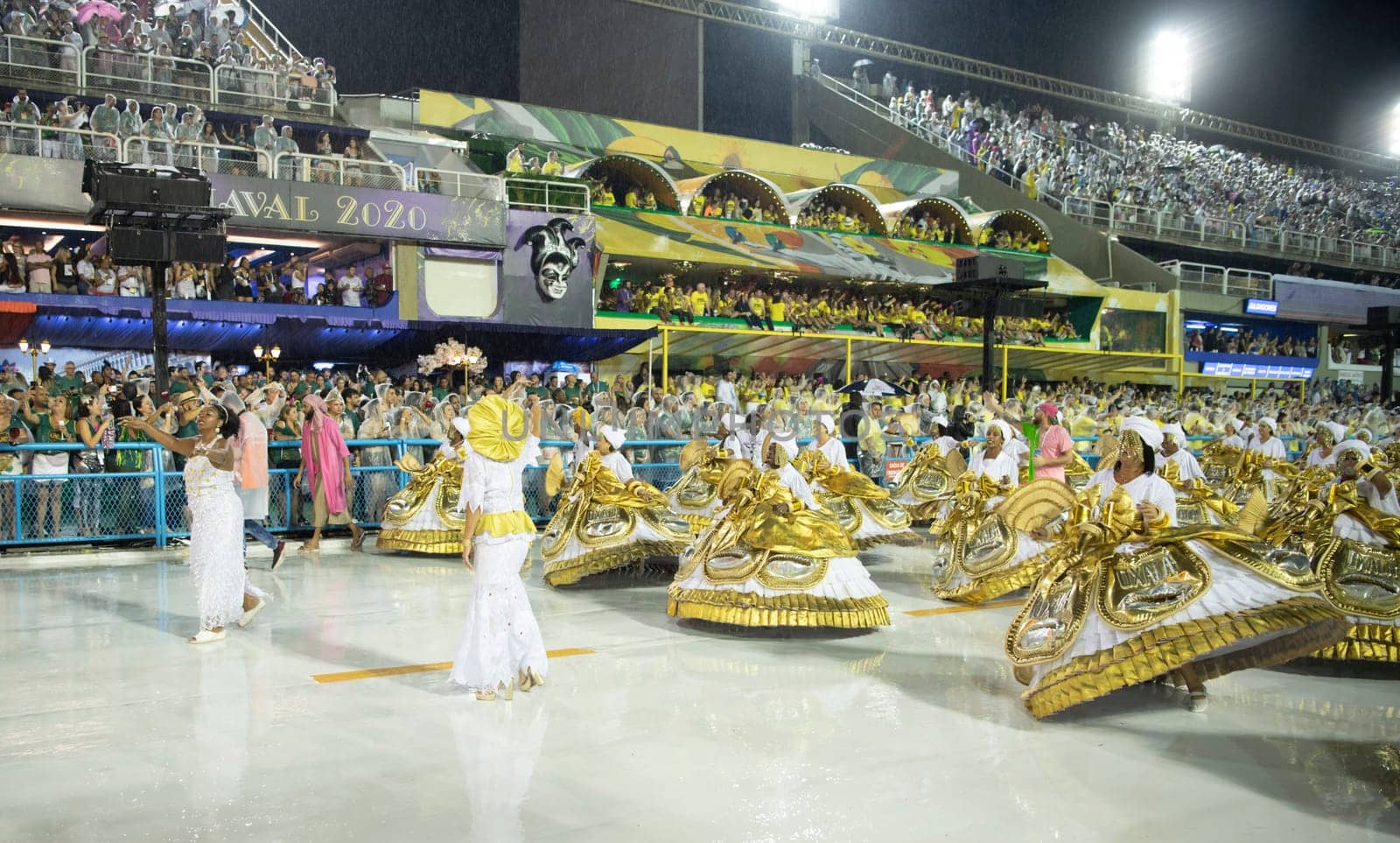 Rio de Janeiro, Brasil-  February 29, 2020: Samba Parade at the 2020 Carnival Champions Parade, Sambodromo. It's raining